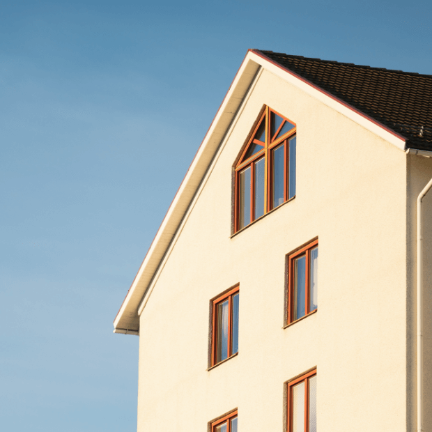 Apartment architecture against clear blue sky