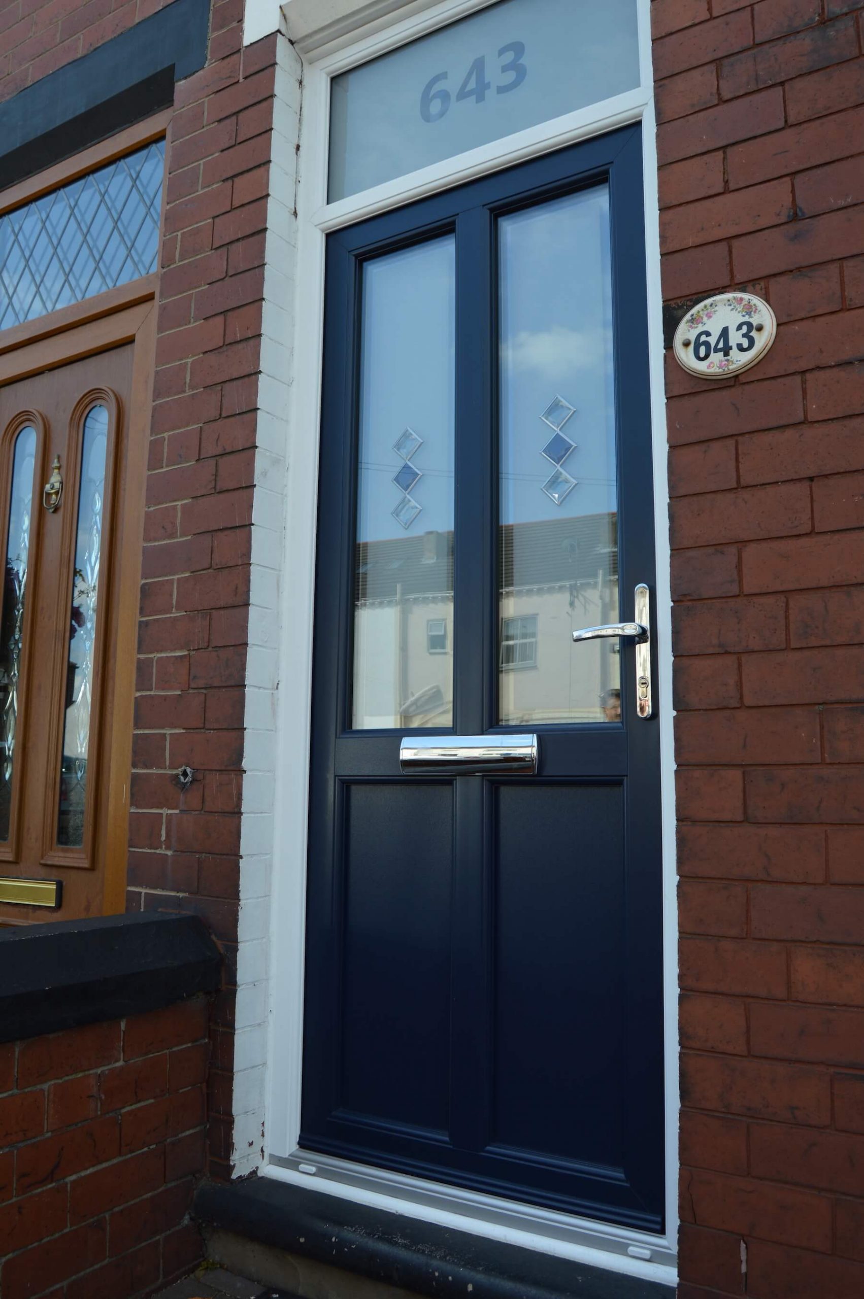 Deep navy coloured entrance door