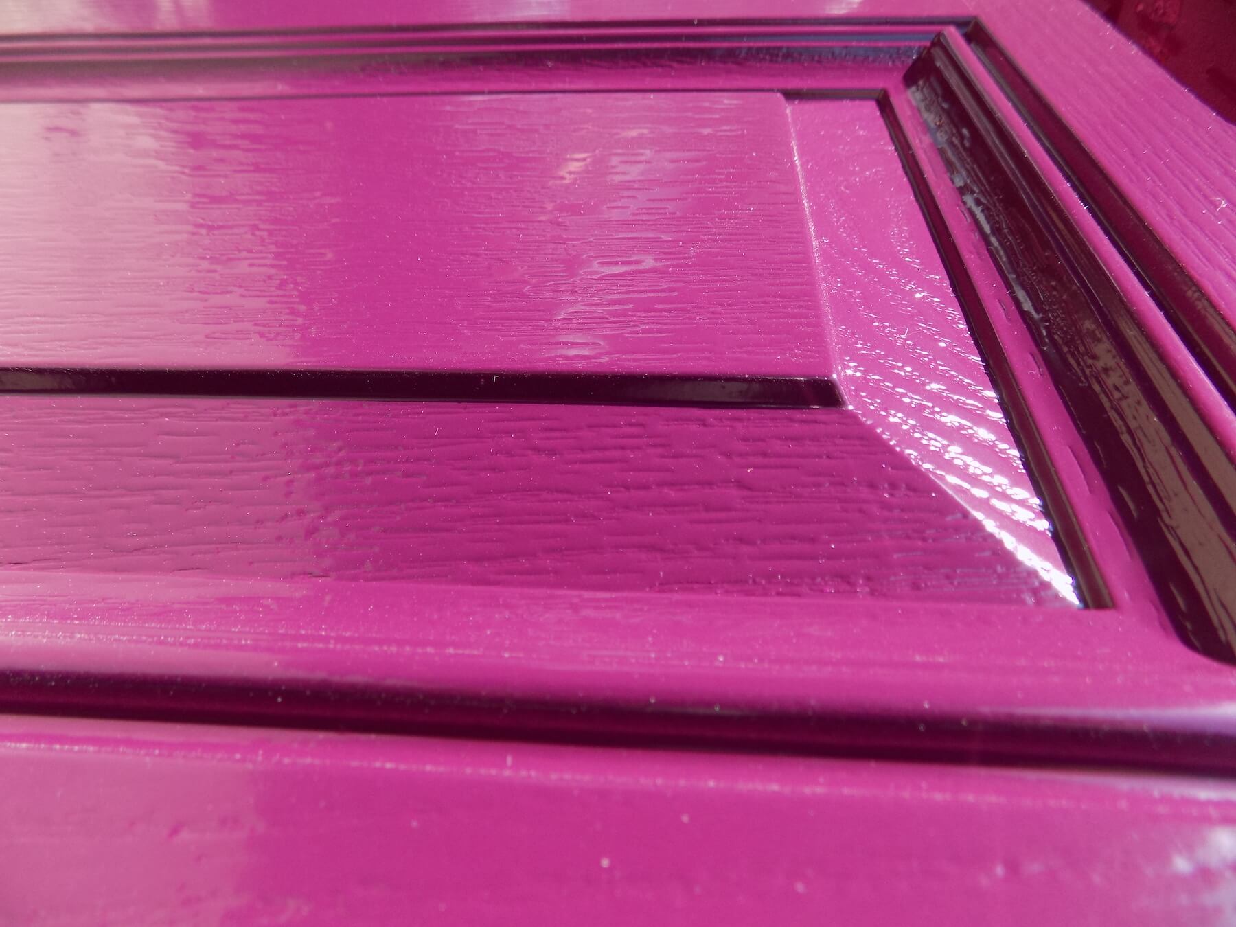 Hot pink coloured coated door