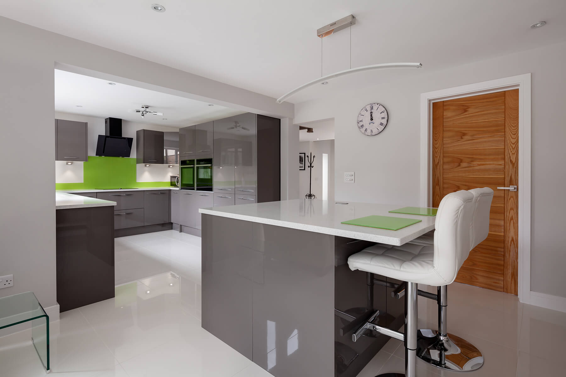 Modern kitchen with green splashback